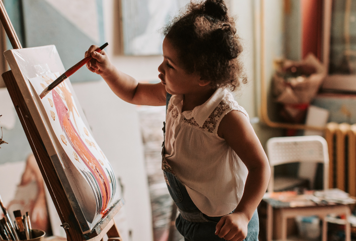 young girl painting